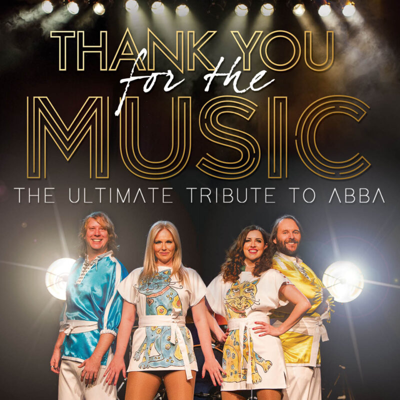 The four members of the Abba tribute band stand in a line on a spotlit stage. They wear flamboyant outfits and stand with their hands on their hips are outstretched at their sides. Above them are the words: Thank you for the music - the ultimate tribute to Abba.