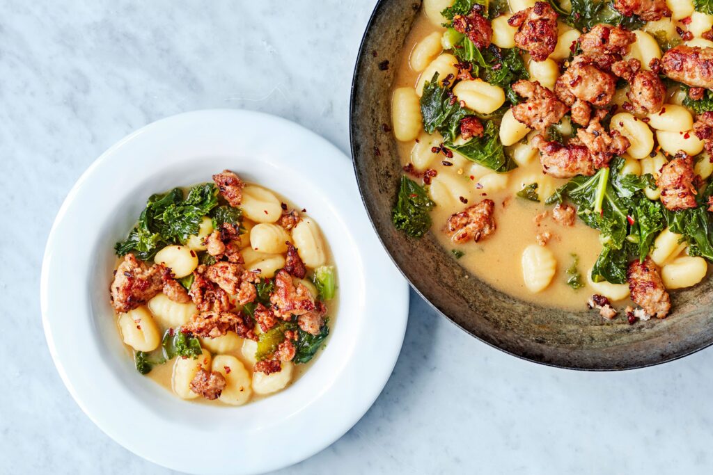 Sausage, kale and gnocchi one-pot
