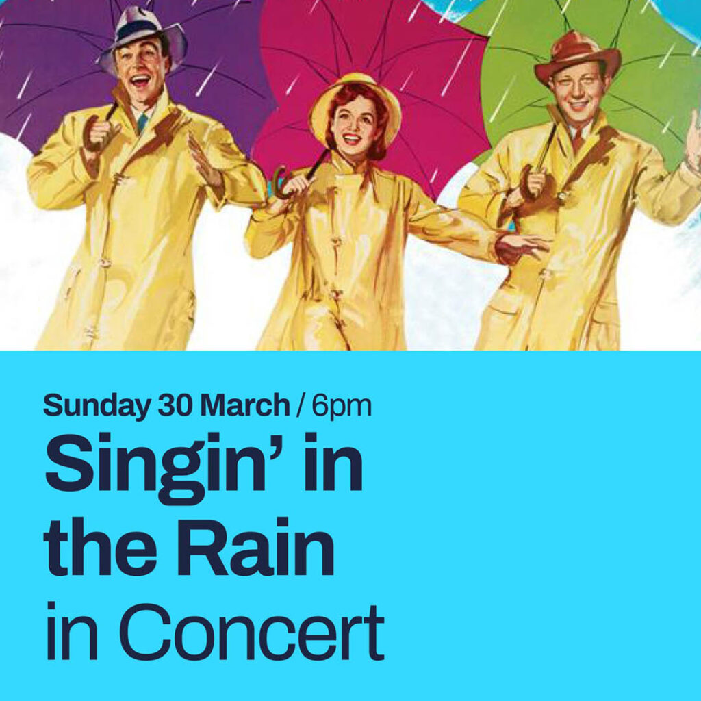A movie style drawing of two men and a woman in yellow raincoats, each holding a different coloured umbrella and singing. Below the image, a bright blue strip features the words: Singin in the Rain in concert. Sunday 30 March.