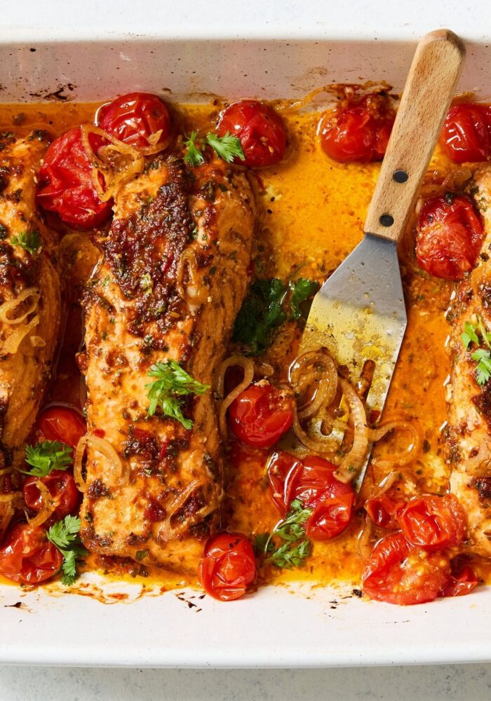 Baked salmon with harissa and cherry tomatoes