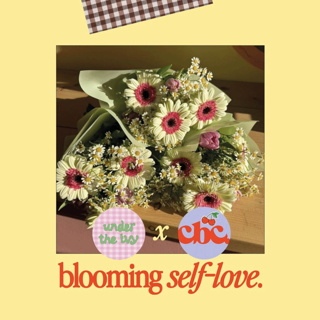 A bouquet of yellow flowers lies on a wooden surface. Beneath this, red cursive text against a pale yellow background says: Blooming self love, Under the Ivy x CBC.