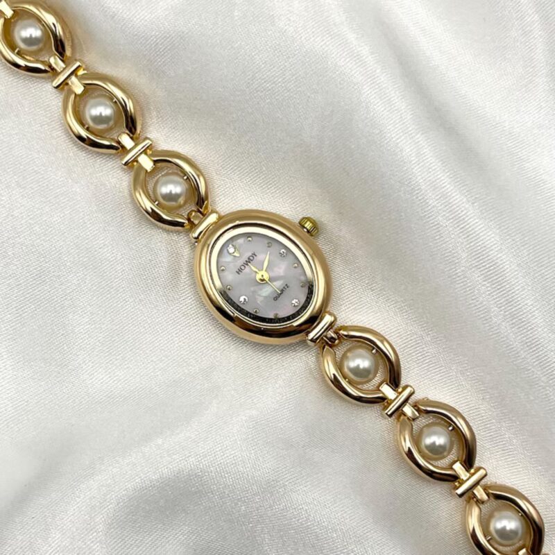 Gold pearl watch - £37.50 