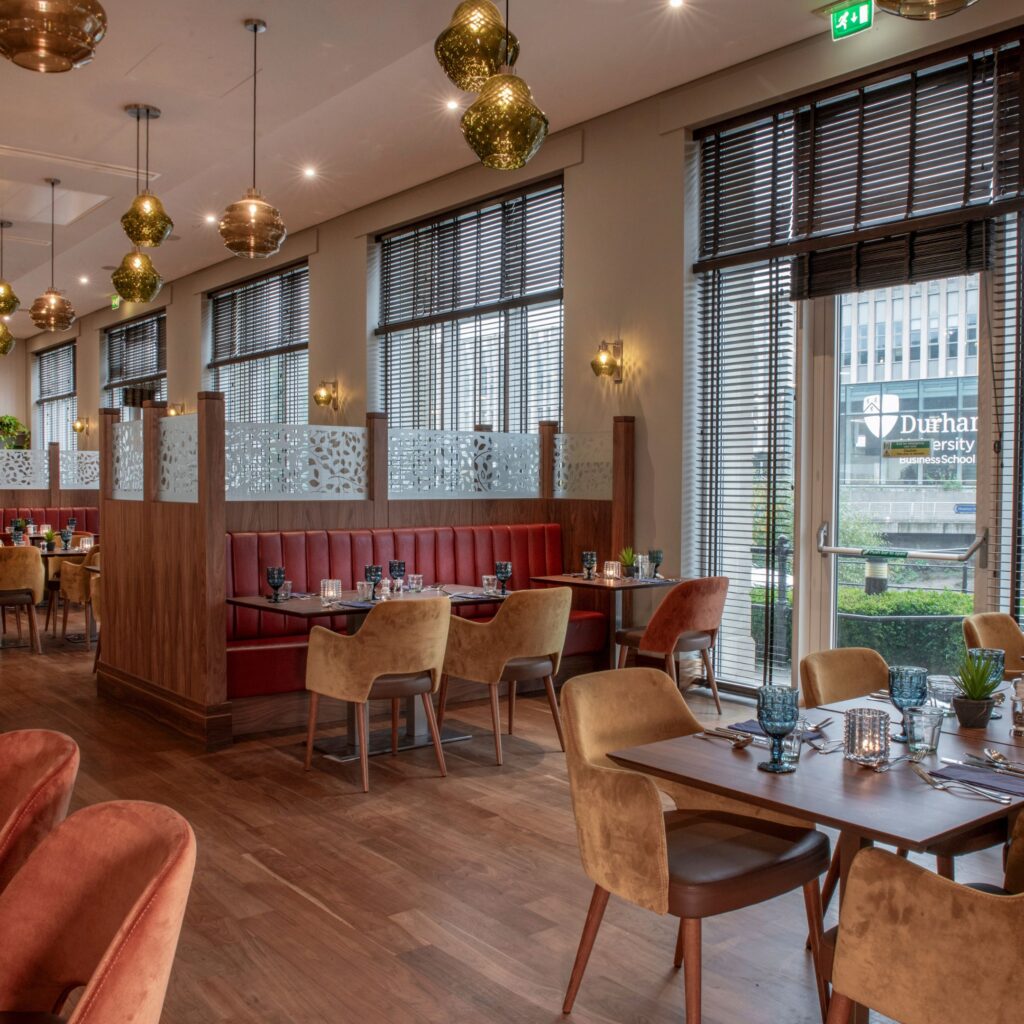 Why Radisson Blu Durham should be your festive getaway for 2025 Radisson Blu’s transformation is well underway, with a £5 million refurbishment continuing through to 2026. Phase Two—completed this summer—has elevated 83 bedrooms into calm, contemporary sanctuaries designed with comfort, functionality and sustainability in mind. Expect plush king-size beds, high-spec bathrooms, Chromecast smart TVs, in-room mini fridges, floor-to-ceiling mirrors and beautifully curated lighting. Eco-conscious touches, including refillable water stations and low-energy fixtures, make the experience feel modern and thoughtful. The design takes subtle cues from the riverside itself, blending stone tones, soft blues and slate accents to create rooms that feel warm, grounded and unmistakably Durham.
