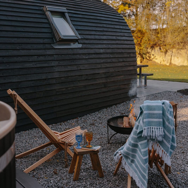 Outside shot of the firepit area of Hewn, Yorkshire