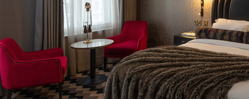 Interior shot of bedroom at Hotel Gotham