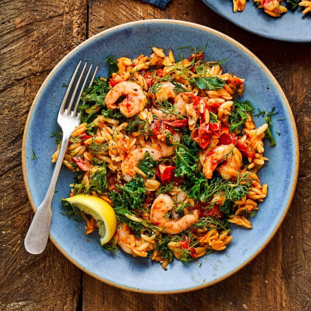 Baked prawn orzo with a spicy harissa kick