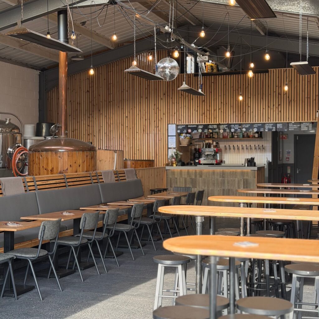 Low Quay Brew Co outdoor seating with converted shipping-container bar, North Shields Fish Quay.