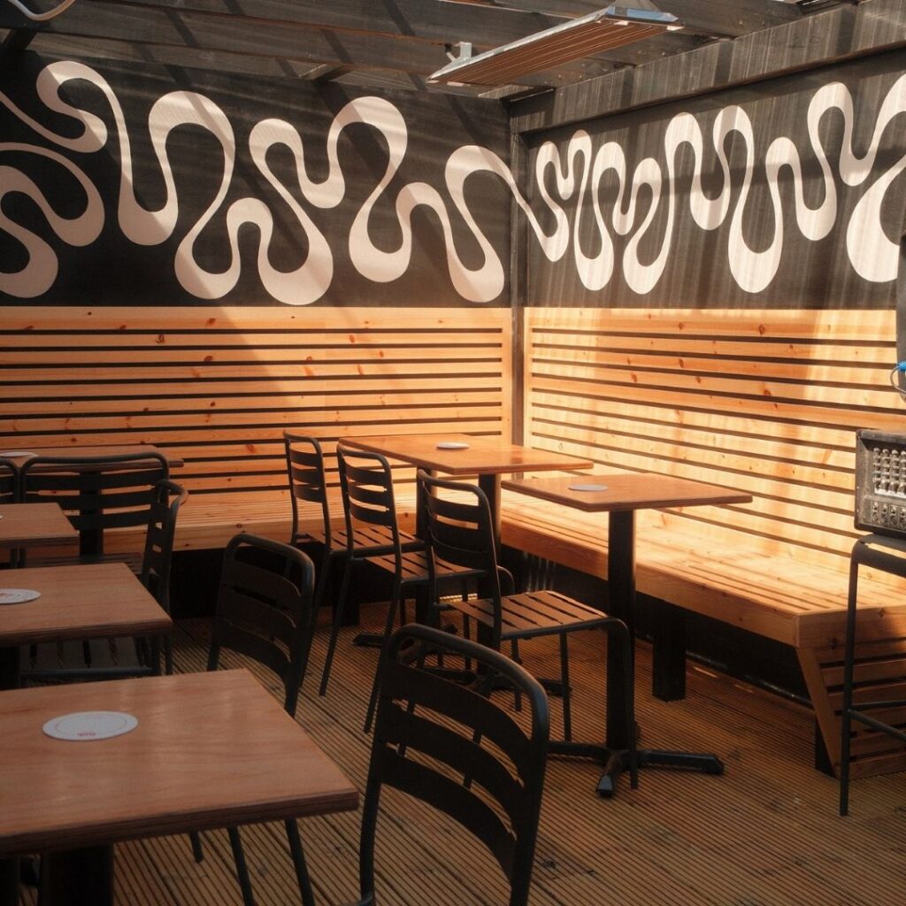 Low Quay Brew Co outdoor seating with converted shipping-container bar, North Shields Fish Quay.