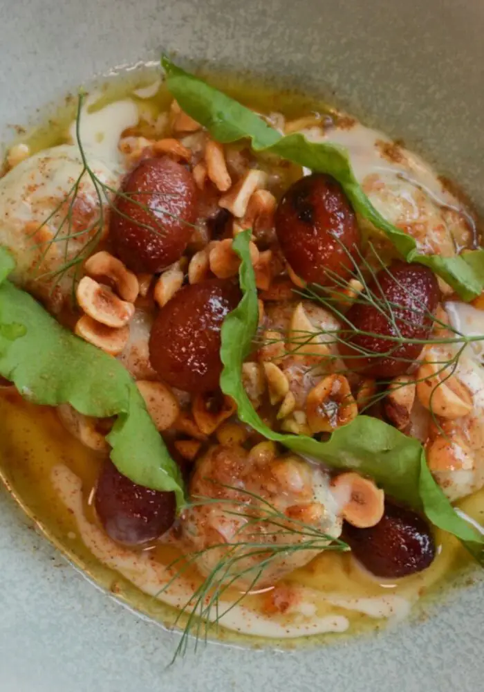 San Sabino style Ricotta Gnudi with roasted grape sauce