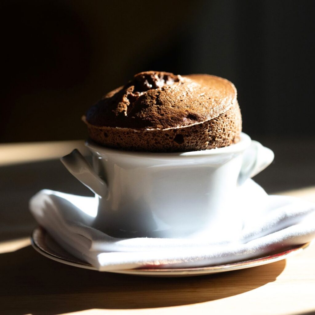 Warm chocolate soufflé, sour cream ice cream. Restaurant Biedronka at South Causey Inn